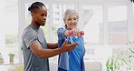 Rehabilitation support, exercise and physiotherapist with a woman for fitness help and muscle recovery. Talking, training and a senior patient working on strength with a black man in physiotherapy