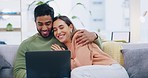 Happy, love and couple on a sofa, laptop and bonding at home, relax and talking in the living room. Hug, man and woman on a couch, pc and technology in living room, search internet and quality time