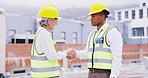 Handshake, construction site or engineering people in collaboration of maintenance building deal together. Mature woman, black man or architect team shaking hands or talking in b2b industrial project