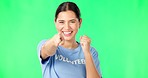 Volunteer woman, green screen and point at you for recruitment, welcome or service with applause in mock up. Girl, volunteering mockup and excited face with fist celebration in studio mockup portrait