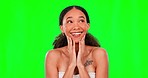 Wow, surprised and happy woman on green screen studio with good news, sale or deal on mockup background. Omg, shocked and excited female with hands on face emoji for announcement or beauty discount 