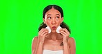 Beauty, cotton pads and woman on green screen for wellness, facial treatment and silly expression. Skincare, spa and portrait of girl with comic, emoji face and patch for natural cosmetics in studio