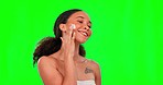 Skincare, cream and face of woman on green screen for wellness, facial treatment and skincare. Dermatology, spa products and happy girl apply anti aging lotion, moisturizer and cosmetics in studio