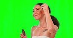 Serum, beauty and face of woman on green screen for wellness, skincare and facial treatment in studio. Dermatology, essential oil and happy girl with dropper for cosmetics, anti aging and moisturizer