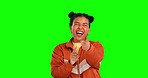 Woman, hand pointing and laughing face with green screen and happiness with selection. Happy, isolated and studio background with a young female model with choice and emoji hands gesture with a smile