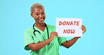 Nurse, smile and black woman with donate poster in studio isolated on a blue background mockup. Face portrait, surgeon and person with charity sign for blood, medical help and organ donation.