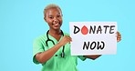Face, black woman and doctor with paper, donate now and healthcare against blue studio background. Portrait, female employee and medical professional with poster, blood drop and announcement for info