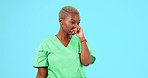 Doctor stress, thinking and a sad black woman isolated on a blue background in studio. Anxiety, mental health and an African nurse or surgeon with thoughts of surgery loss, grief and medical problem