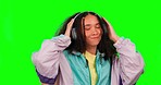 Dance, happy and woman with headphones, green screen and confident girl against a studio background. Female person, girl and model with headset, motivation and streaming music with songs and audio