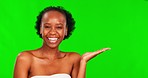 Green screen, beauty and black woman showing product for promotion, advertising and treatment in studio. Skincare mockup, chromakey and portrait of girl gesture cosmetics, natural makeup and facial