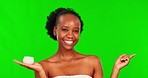 Green screen, skincare and black woman point with cream, lotion or moisturizer for facial treatment. Dermatology, natural beauty and portrait of happy female person with face creme product in studio