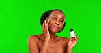 Beauty product, black woman and green screen with skincare, serum and essential oil. Chromakey, cosmetics and dermatology treatment with a African female model with collagen and hyaluronic acid
