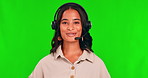 Customer service, call center and a woman with a headset on a green screen. Face portrait of african person as a agent or consultant talking and laughing for crm, sales support and telemarketing