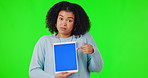 Woman, tablet and pointing finger at mockup on green screen for bad review or poor network. Portrait of African female person while confused and unsure about website, advertising and app review or ux
