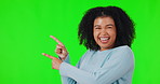Happy woman, pointing finger and green screen for advertising, announcement or promotion. Face and hands of excited african female person laughing on studio background for mockup space, sale or deal