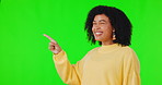 Pointing finger, happy woman and green screen for advertising space, announcement or promotion. African female person portrait on studio background with hands for mockup, information list or choice