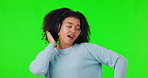 Woman, headphones and dancing to music on green screen with happiness, energy and connection. African female person on a studio background to dance, listen to audio or radio for fun and freedom