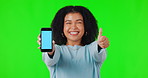 Woman, phone and thumbs up for mockup on green screen with a smile and hand for support or approval. Portrait of a African person with a smile and emoji for website, advertising and app review or ux