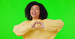 Heart, portrait of woman with hand and against a green screen for love. Thank you or support, kindness or sign and happy female person with emoji gesture for peace or care against a chroma key