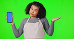 Woman, phone mockup and advertising on green screen for choice or decision against a studio background. Portrait of female person holding mobile smartphone with chromakey display on mock up space