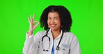 Okay hand, happy woman or doctor on green screen for healthcare success or services support. Like agreement sign, ok emoji or reliable medical worker smiling in face portrait isolated in studio 