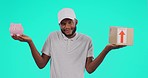 Delivery, black man and confused with box and piggy bank in studio isolated on a blue background. Saving money, courier and male person with package, decision for ecommerce choice or budget portrait.