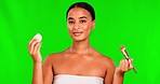 Green screen, makeup and woman face with brush and blender in studio for comparison on mockup background. Portrait, beauty and Indian female with product for choice, results and foundation decision