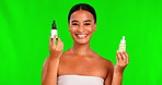 Green screen, woman and face for comparison of beauty serum, oil product or makeup cosmetics on background. Portrait, happy female model and advertising choice of bottles, skincare review or decision