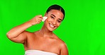 Woman, green screen and gua sha for face massage, aesthetic skincare and dermatology on studio background. Portrait of happy female model, beauty and crystal stone tools for facial lymphatic drainage