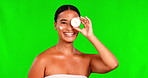 Cream, face and skincare for woman on green screen for beauty, product and healthy dermatology on studio background. Portrait, sunscreen and girl with cosmetic container, lotion and natural glow