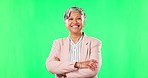 Green screen, crossed arms and face of business woman with pride, confidence and smile on studio background. Manager, chromakey and portrait of senior female person with mission, success and vision
