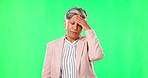 Stress, anxiety or businesswoman on green screen with headache pain from job pressure or burnout fatigue. Bad migraine problem, studio or tired mature manager depressed or frustrated by deadline 