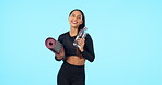 Happy woman, yoga and water on mockup for workout, exercise or zen against a blue studio background. Portrait of fit female person or yogi with smile for spiritual wellness or health on mock up space