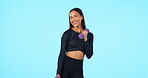 Happy woman, fitness and weightlifting dumbbells on mockup in workout against a blue studio background. Portrait of fit or active female person lifting weights with smile in exercise on mock up space