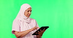 Tablet, woman nurse and green screen isolated on studio background for healthcare typing or doctor online application. Medical, muslim person and research on digital tech, space and telehealth mockup