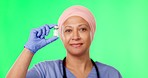 Green screen, doctor and Muslim woman with vial for medicine, medical treatment and vaccine in studio. Healthcare, chromakey and portrait of female worker for wellness, medication and prescription