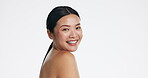 Asian woman, skincare and face of beauty, smile and laser transformation on studio white background. Happy model, portrait and aesthetic wellness for salon cosmetics, healthy shine and dermatology