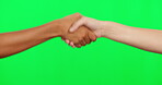 Handshake, people meeting and green screen for welcome, thank you and support, agreement or b2b onboarding. Diversity, thanks or congratulations sign of person shaking hands with partner in studio