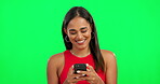 Phone, green screen and woman typing, networking and internet communication on social media. Search, scroll and happy person or model with mobile connection, meme or funny chat on studio background