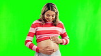 Green screen, love or happy pregnant woman with belly in studio for body wellness or development. Pregnancy, smile or excited mother holding abdomen or stomach for bonding or healthy baby growth 