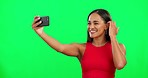 Woman, green screen and selfie with smile, beauty and mockup space for post on social network. Influencer girl, model or young student with photography, profile picture and happy for promo with app