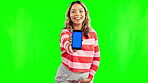 Happy pregnant woman, phone and mockup on green screen for advertising against a studio background. Portrait of female person with smile, tummy or showing smartphone app, chromakey or mock up display