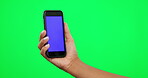 Phone, green screen and person hands for social media mockup, advertising and communication. Smartphone, marketing and people with mobile app, Web 3.0 and ux or ui design space on studio background