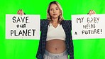 Activism, signs and woman in studio with green screen for pregnancy or maternal protest. Serious, political and portrait of pregnant female person with poster boards isolated by chromakey background.