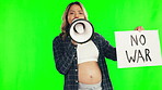 Pregnant woman, megaphone and no war billboard on green screen for protest against a studio background. Portrait of female person or activist with poster sign shouting for protesting on mockup space