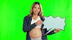 Pregnant woman, speech bubble and social media on green screen for advertising against a studio background. Portrait of happy female person in maternity holding sign, shape or symbol on mockup space