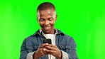 Green screen, smile and black man with a cellphone, typing and connection with mobile app, network or happy. Male person, Ghana and model with a smartphone, joy or social media on a studio background