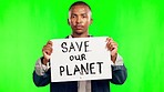 African man, green screen and poster for protest, climate change and serious face for justice for Earth. Young man, activist and billboard to save the planet with mockup space, global warming or goal