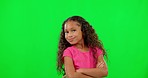 Happy, face and child in a studio with green screen posing in a casual, trendy and stylish kids outfit. Happiness, smile and portrait of girl model with crossed arms isolated by chromakey background.