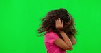 Noise, green screen and hands on ears of girl child in studio with autism, unhappy and frustrated. No, sign and autistic kid with body language for stop, loud and annoyed, problem or loud mistake